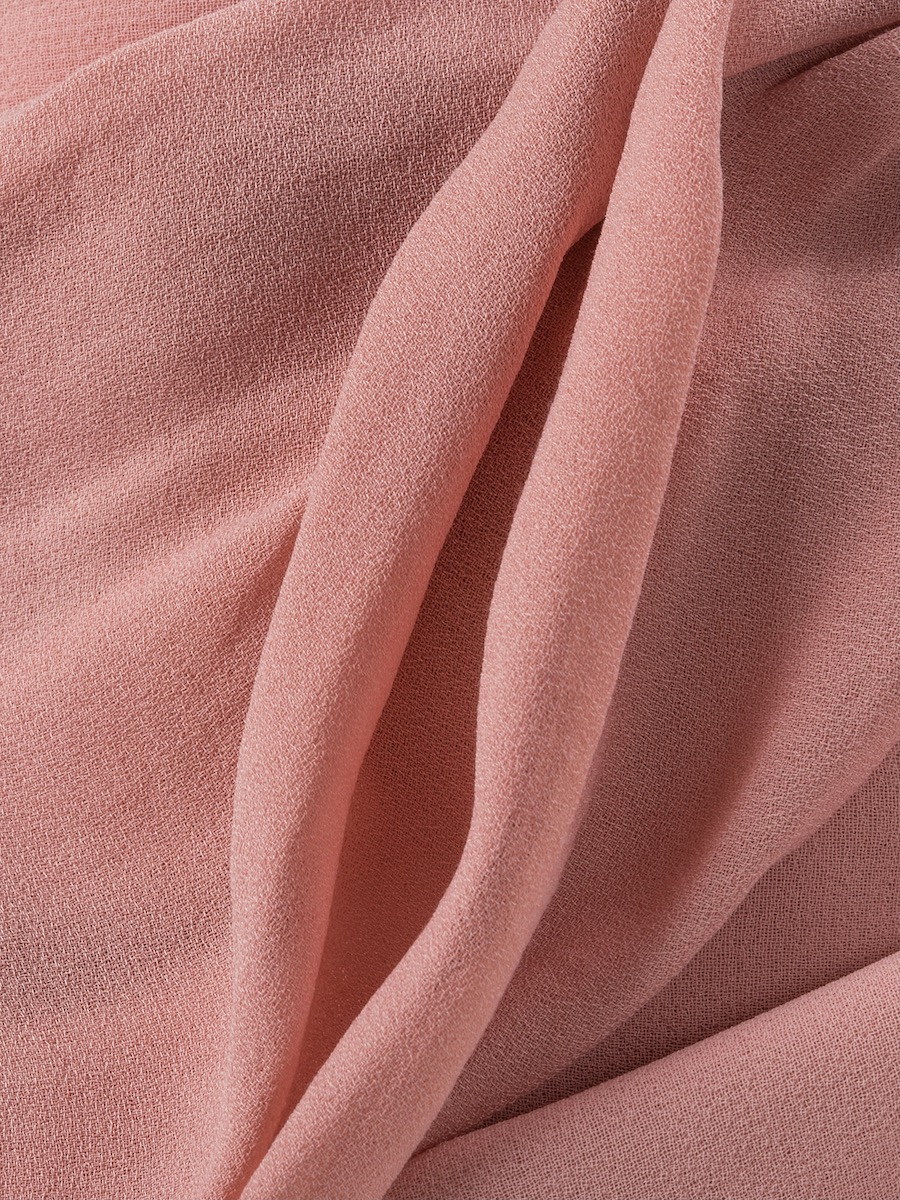 Morbido tessuto rosa a forma di organi genitali femminili, vagina